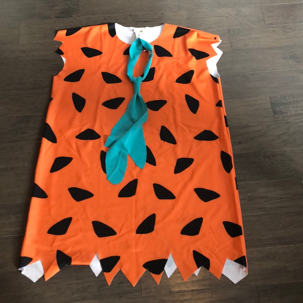 Fred Flintstone costume 4XL. Includes long shirt and tie.